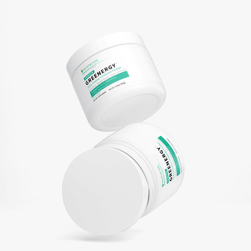 Two containers of Greenergy supplement powder on a white background