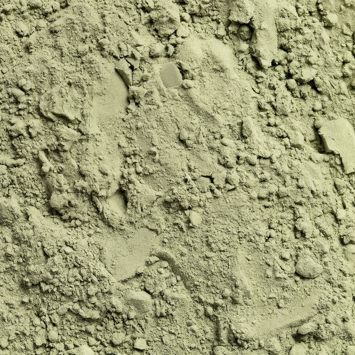 Close-up of greenish-brown powder