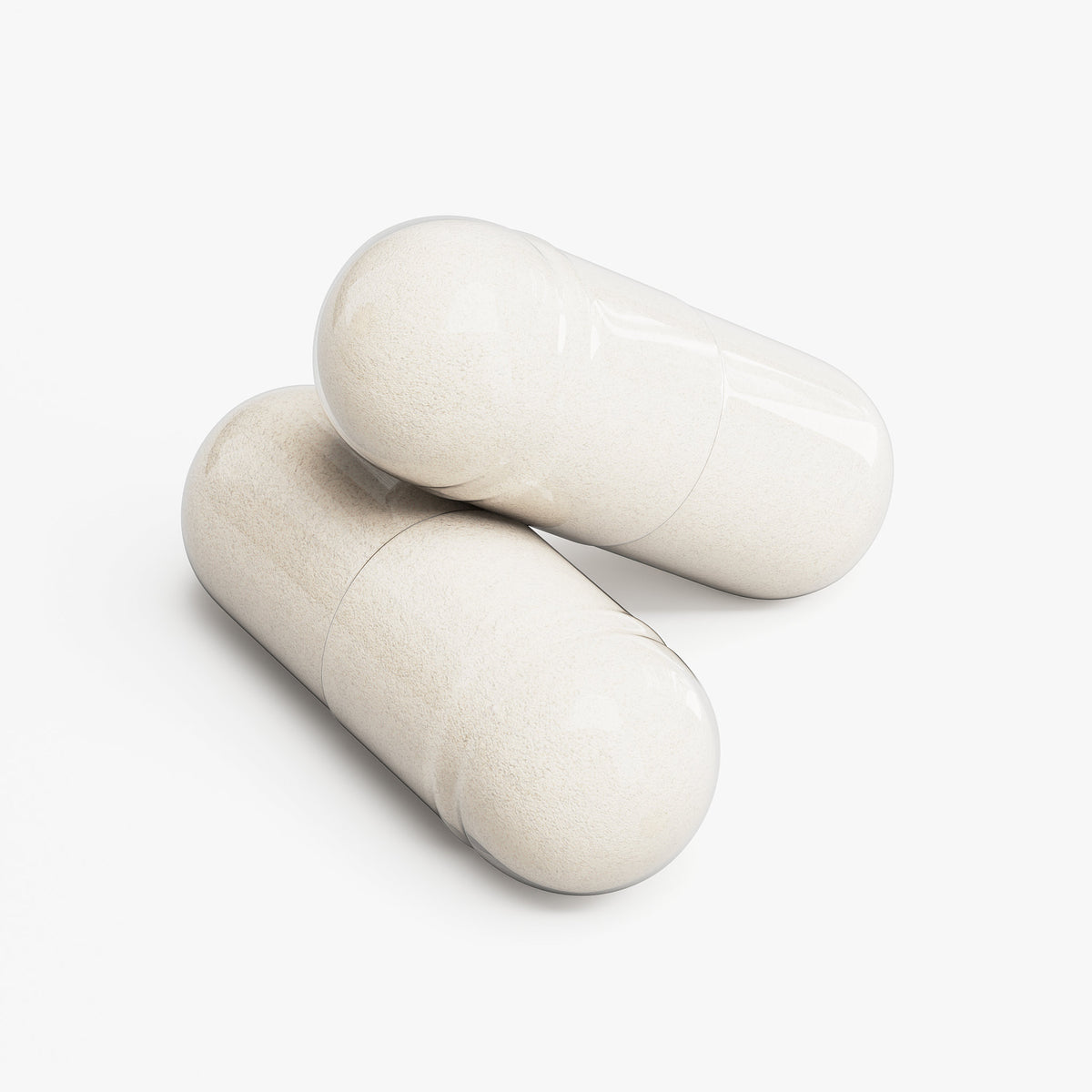 Two beige capsules stacked on a white background