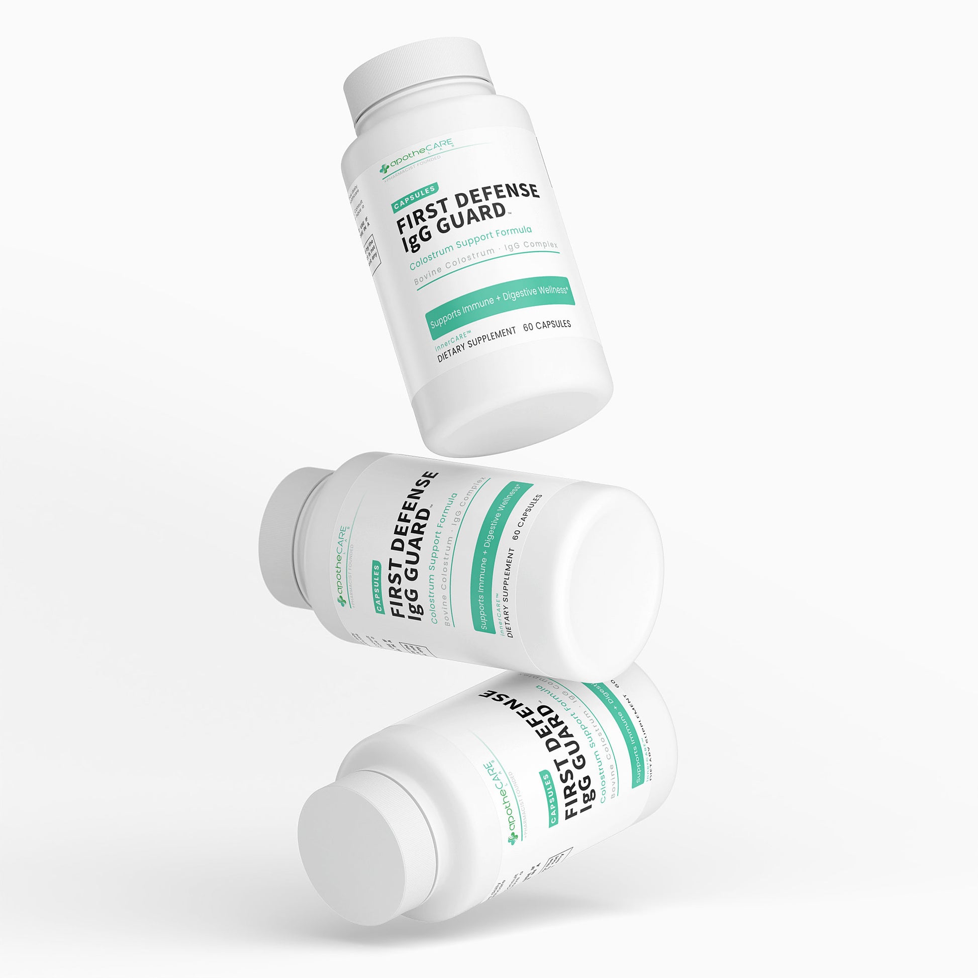Three bottles of 'First Defense IgG Guard' on a white background