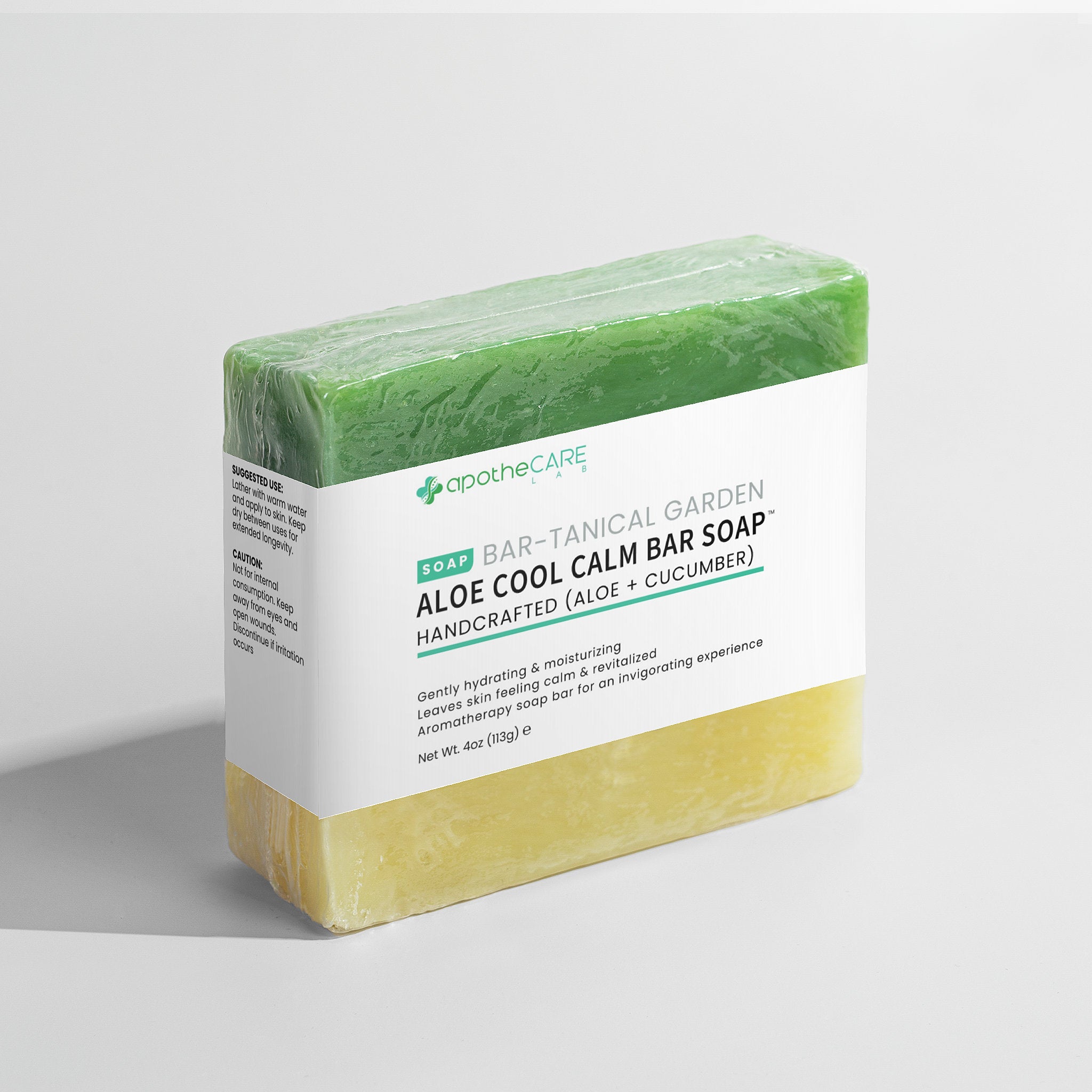 Bar of soap with a green and yellow design on a white background