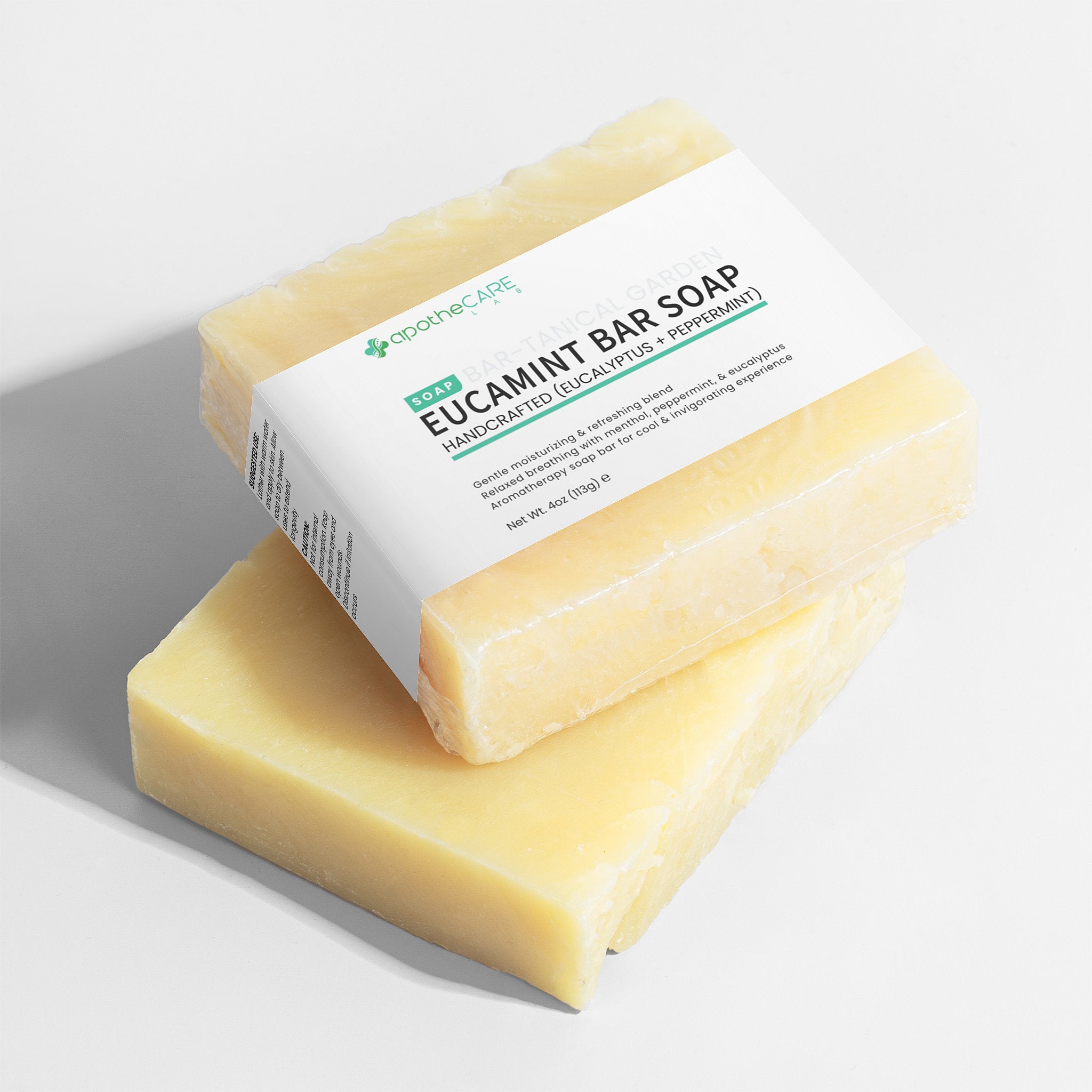 Two bars of eucalyptus bar soap with a label on a light background