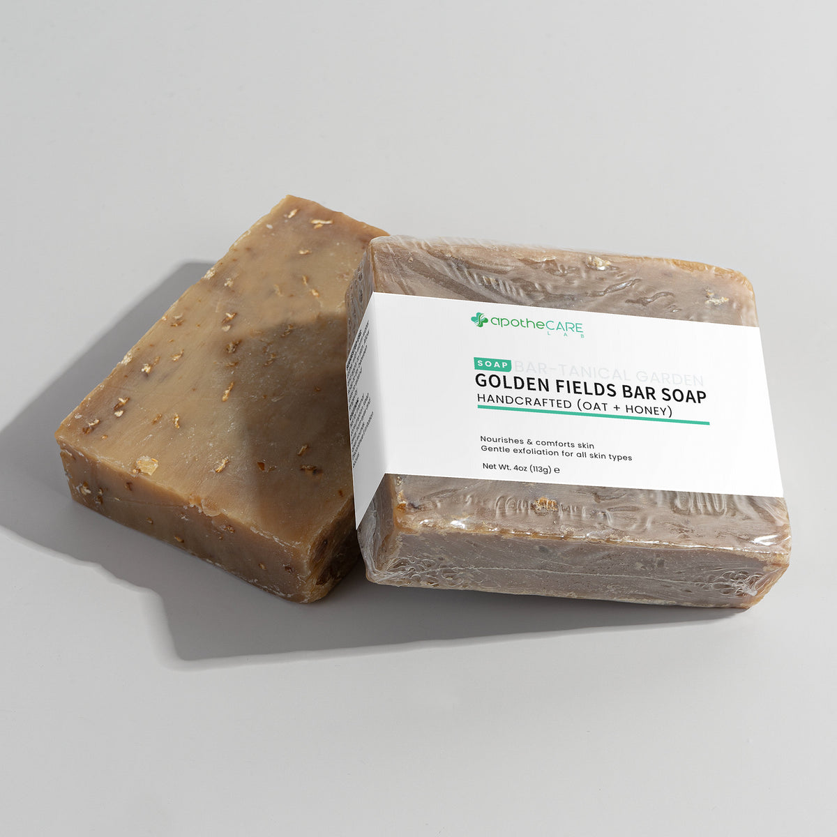 Two bars of Golden Fields Bar Soap with a label on a light gray background