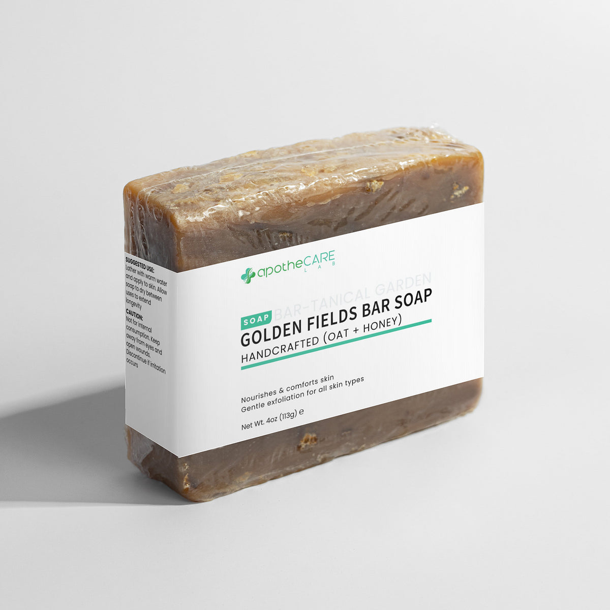 Bar of soap with a white label on a light gray background