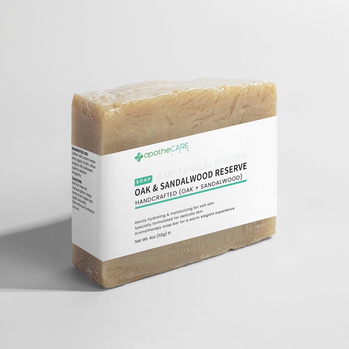 Bar of soap with a white label on a light gray background