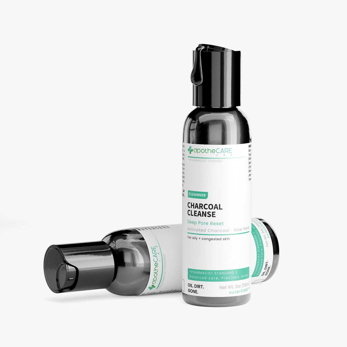 Three ApothoCare Charcoal Cleanse pump bottles with black caps and white labels, arranged on a clean light gray background.