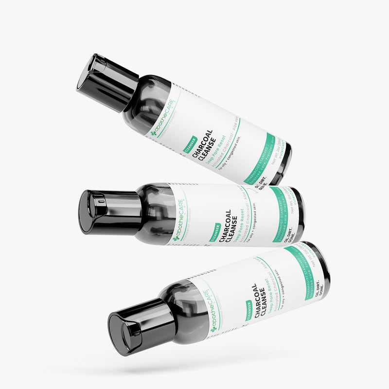 Three bottles of Charcoal Cleanse on a white background