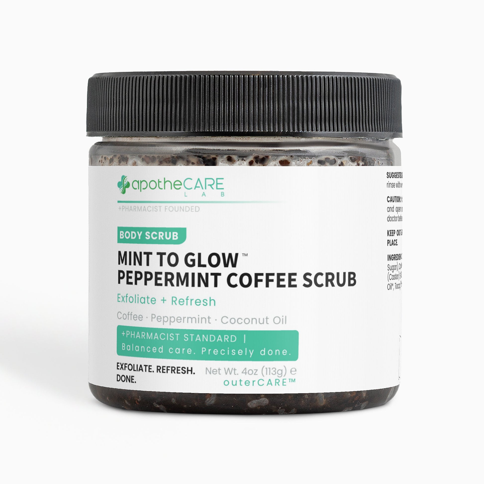 A jar of apotheCARE Lab Mint to Glow Peppermint Coffee Scrub with a black ribbed lid and a white label, set against a plain white background.