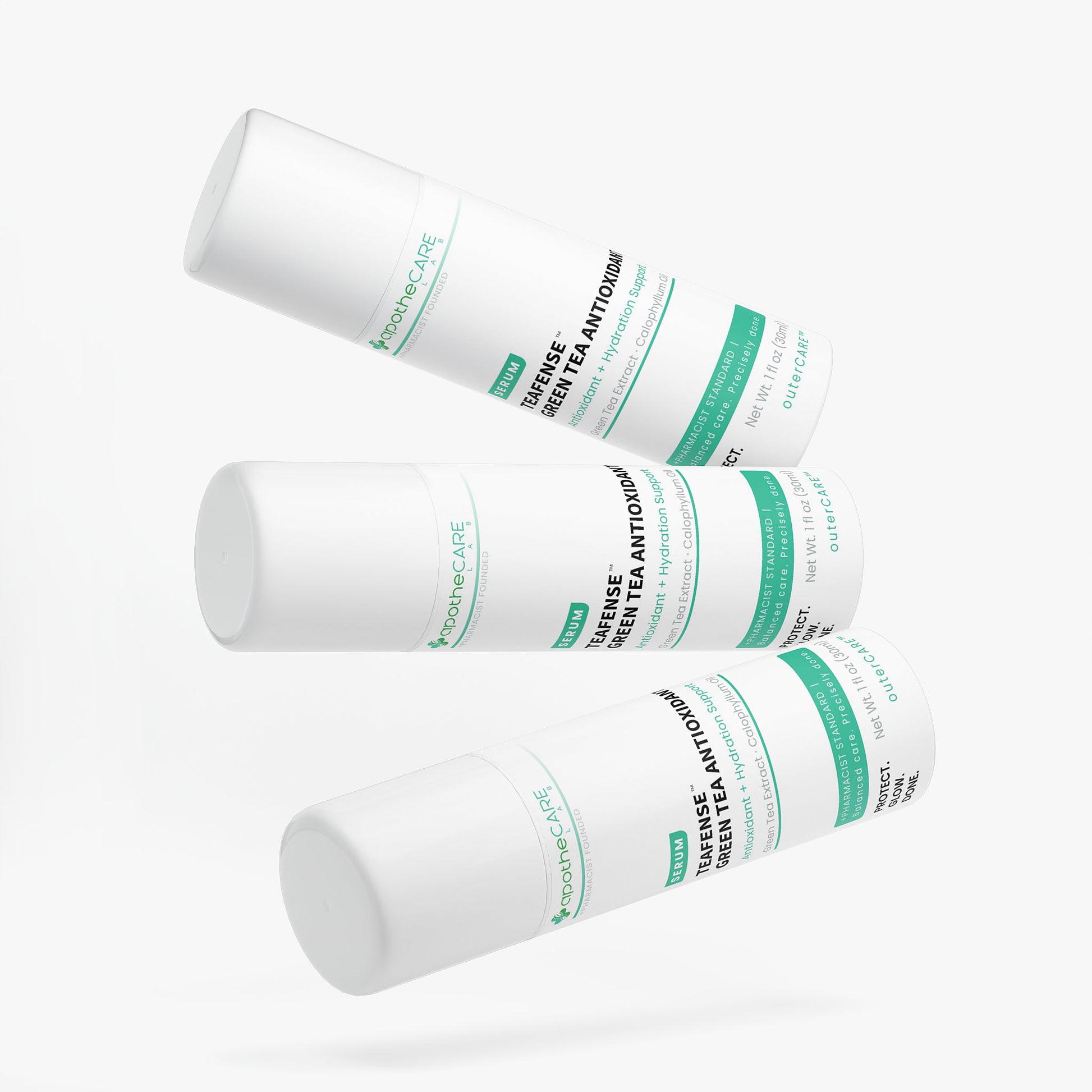 Three white cylindrical skincare bottles labeled Teafense Green Tea Antioxidant, arranged diagonally on a clean white background.