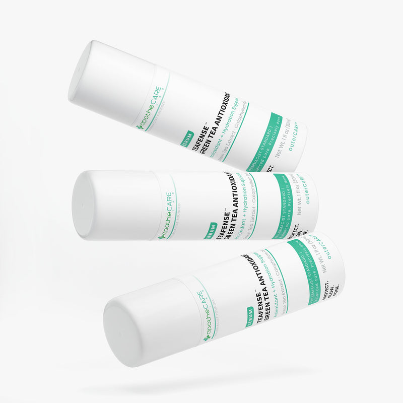 Three white cylindrical skincare bottles labeled Teafense Green Tea Antioxidant, arranged diagonally on a clean white background.