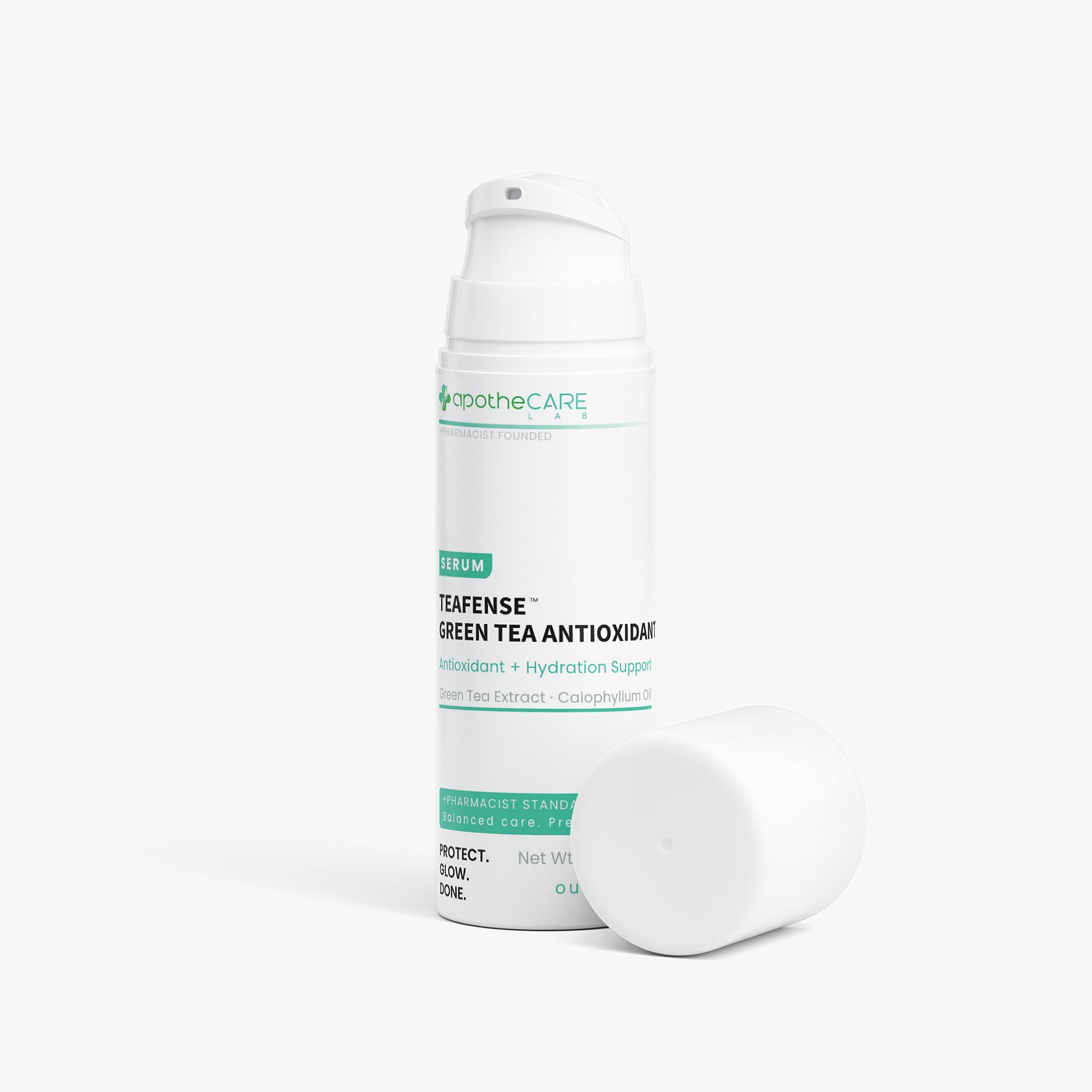 A white cylindrical serum bottle labeled Apothcare Teafense Green Tea Antioxidant, shown with its cap placed beside it on a clean white background.