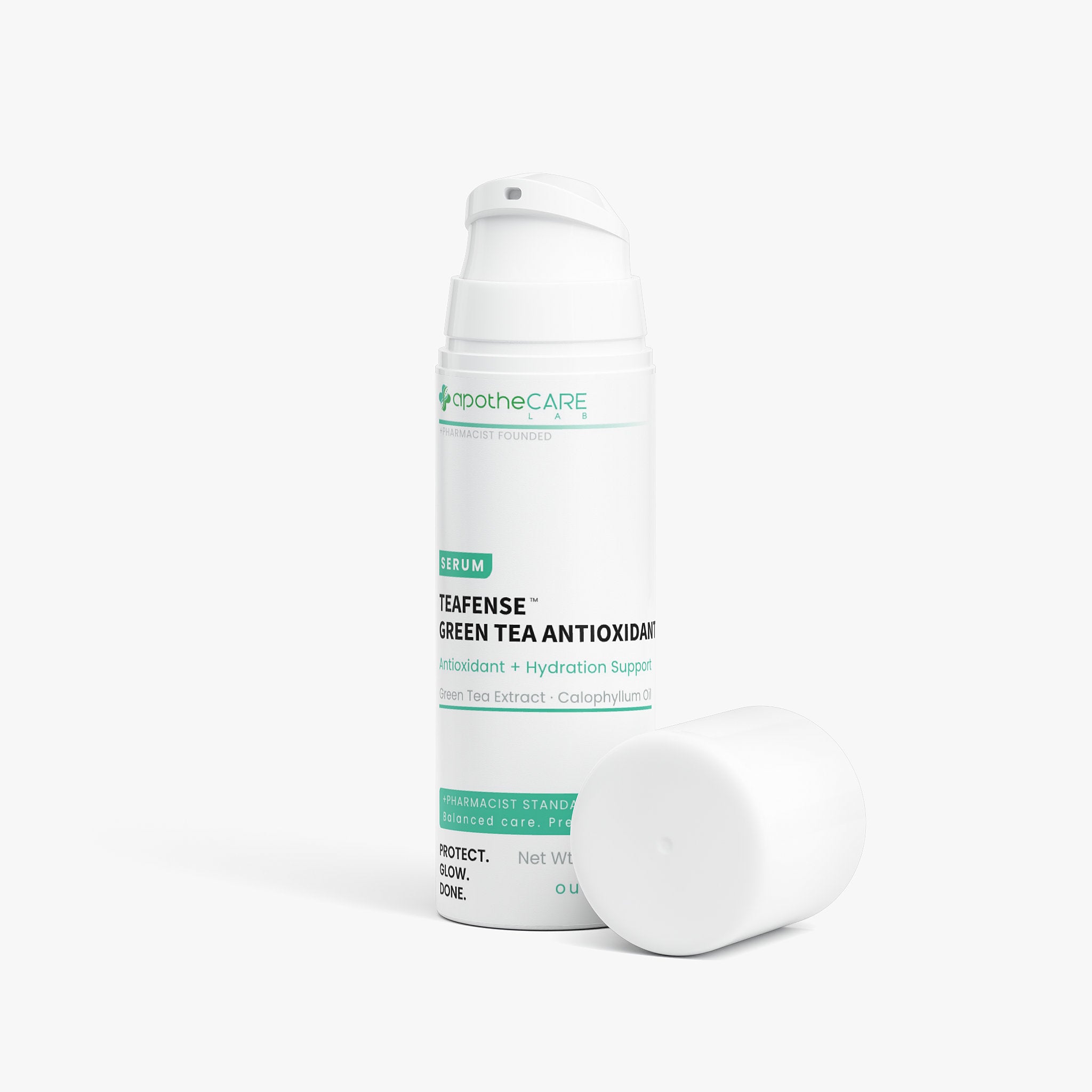 A white cylindrical serum bottle labeled Apothcare Teafense Green Tea Antioxidant, shown with its cap placed beside it on a clean white background.