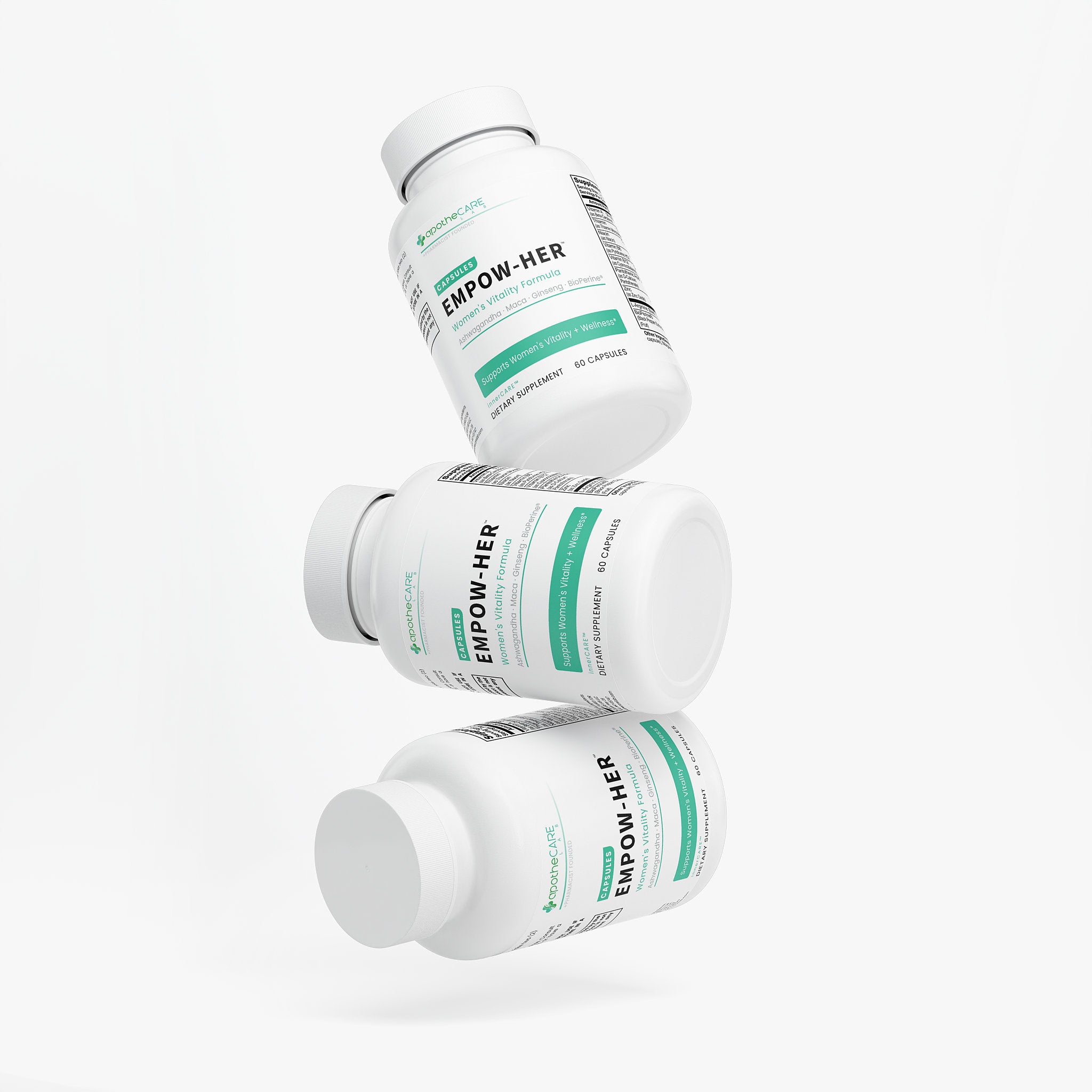 Three Women's Vitality Formula supplement bottles stacked on a white background