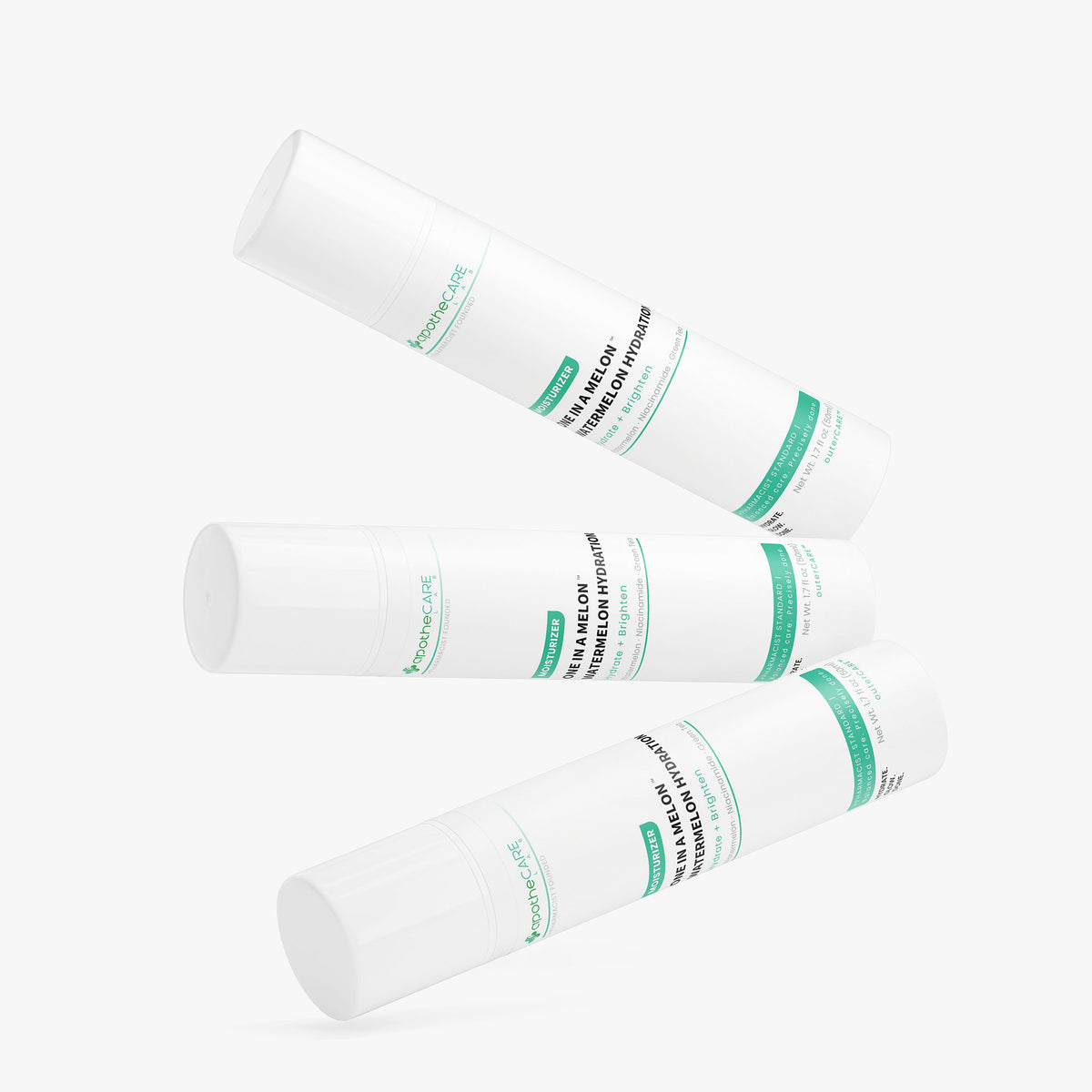 Three white cylindrical cosmetic tubes arranged diagonally on a light gray background. The tubes feature green and black text, including the visible brand name 'apotheCARE LAB'.