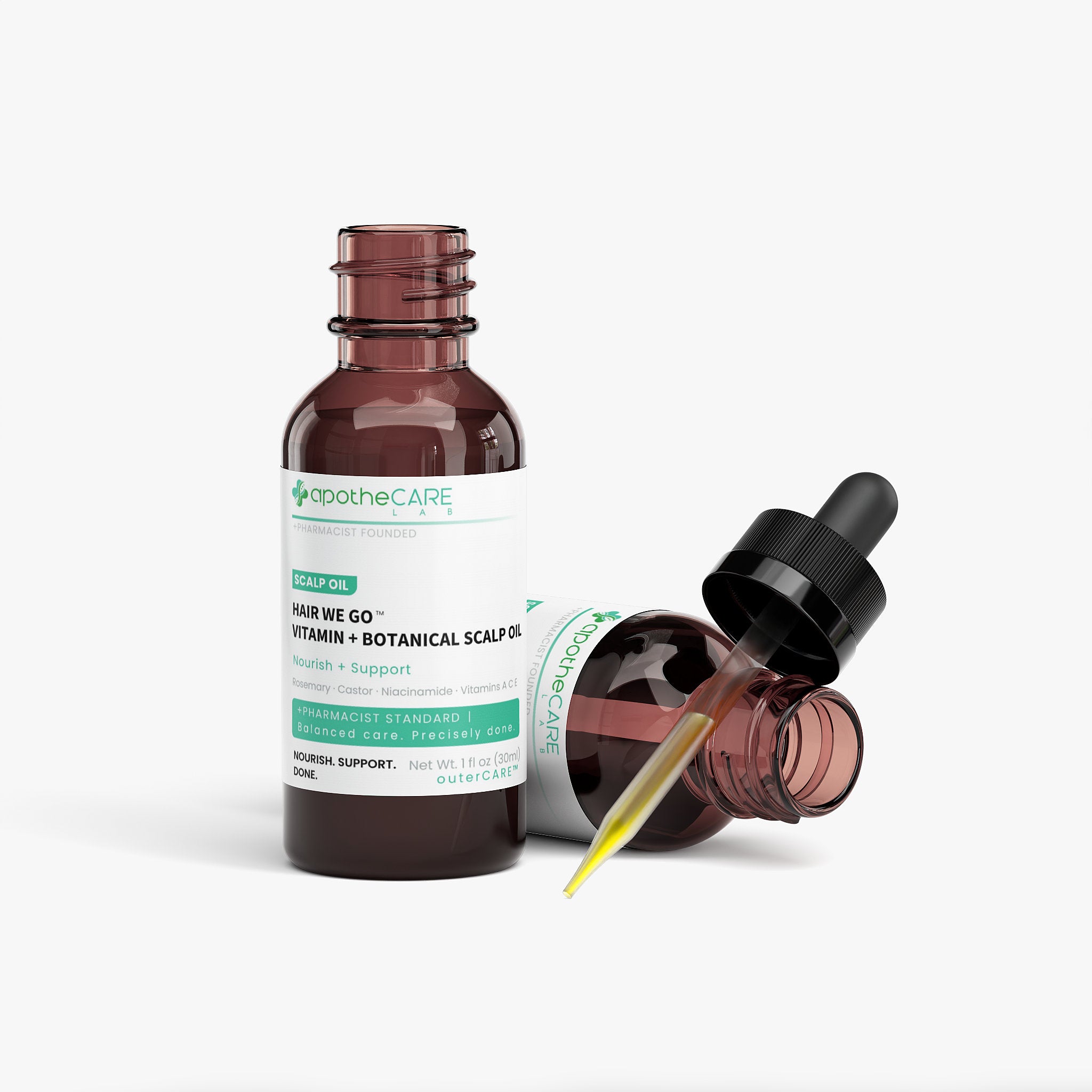 An amber glass dropper bottle of ApotheCare Hair We Go Scalp Oil, shown alongside a second bottle with its dropper removed and lying on its side, against a clean white background.
