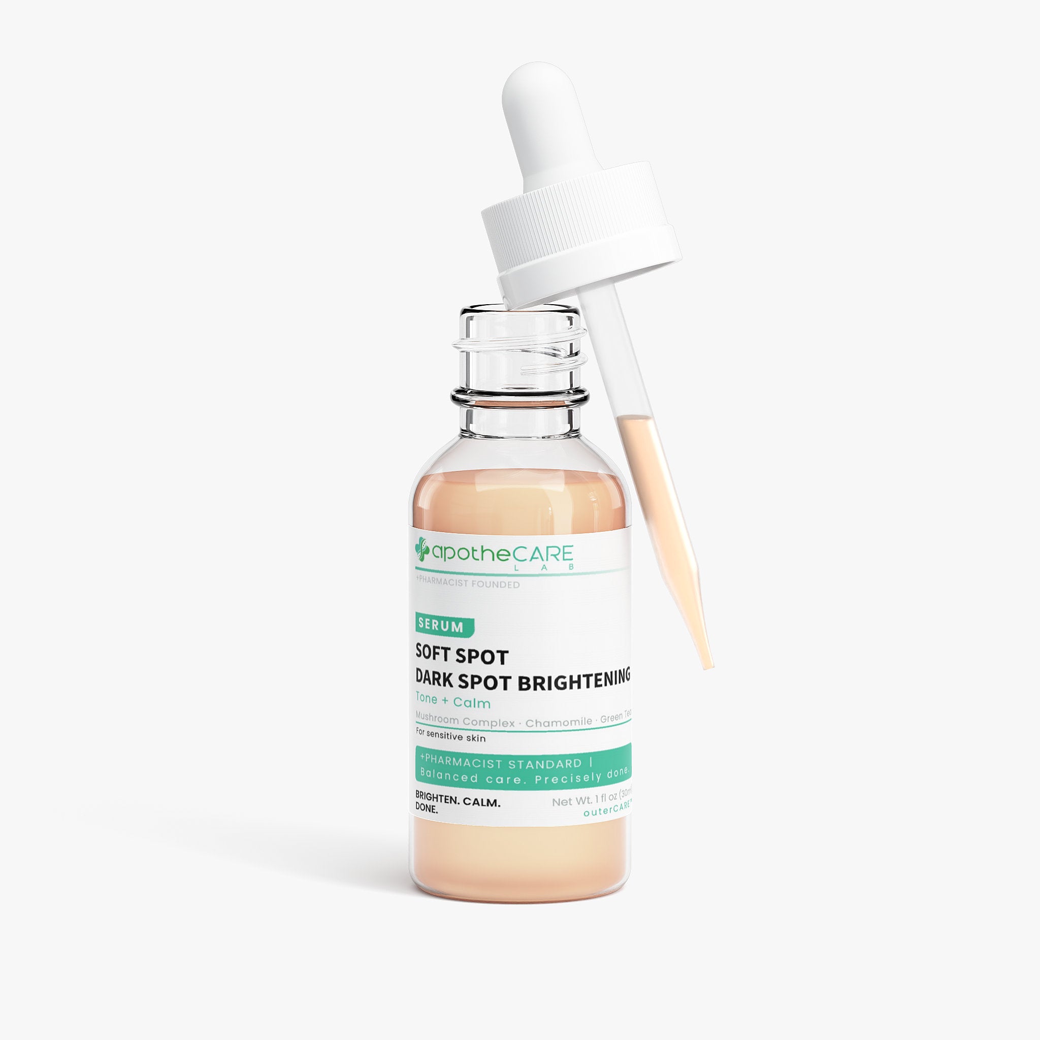 A glass dropper bottle of apotheCARE LAB Soft Spot Dark Spot Brightening Serum with a white dropper cap, filled with a pale peach-colored liquid, set against a clean white background.