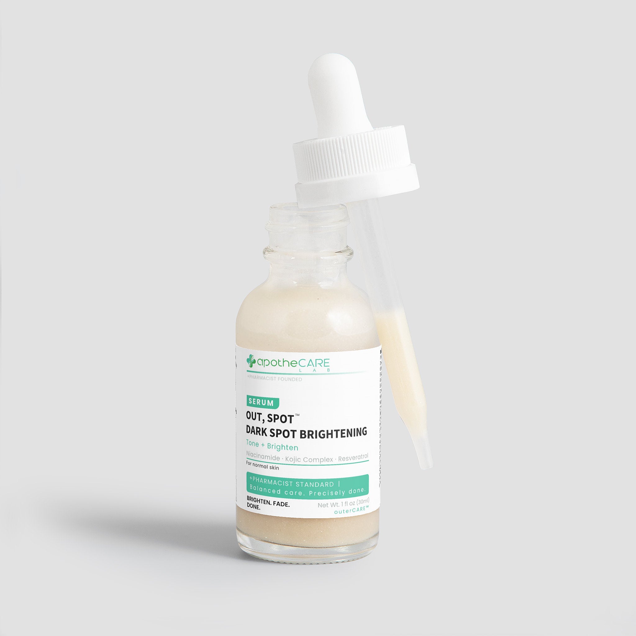 A glass dropper bottle of Apothecare Lab Out, Spot. Dark Spot Brightening Serum with a white dropper cap, set against a light gray background.