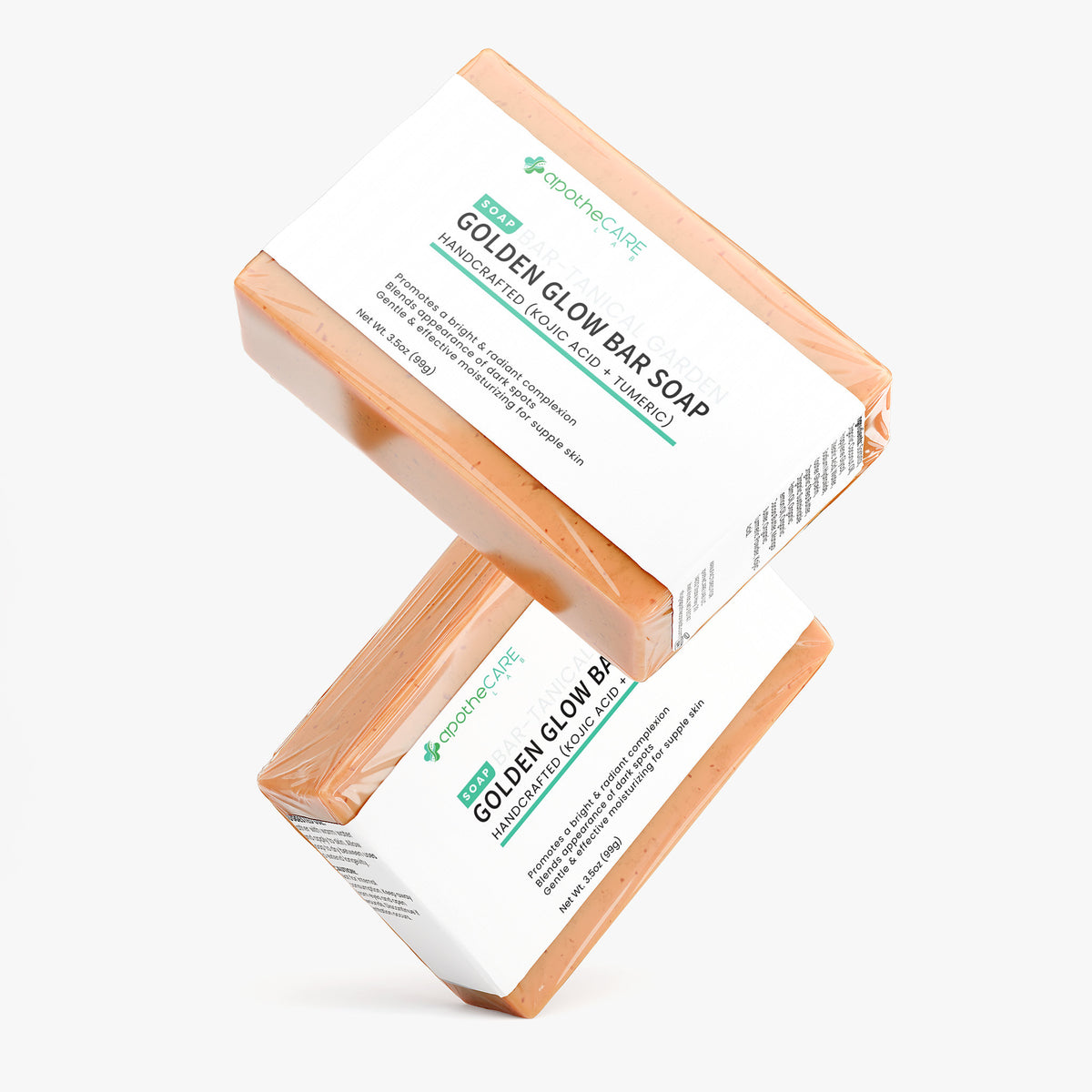 Two bars of soap with packaging on a white background