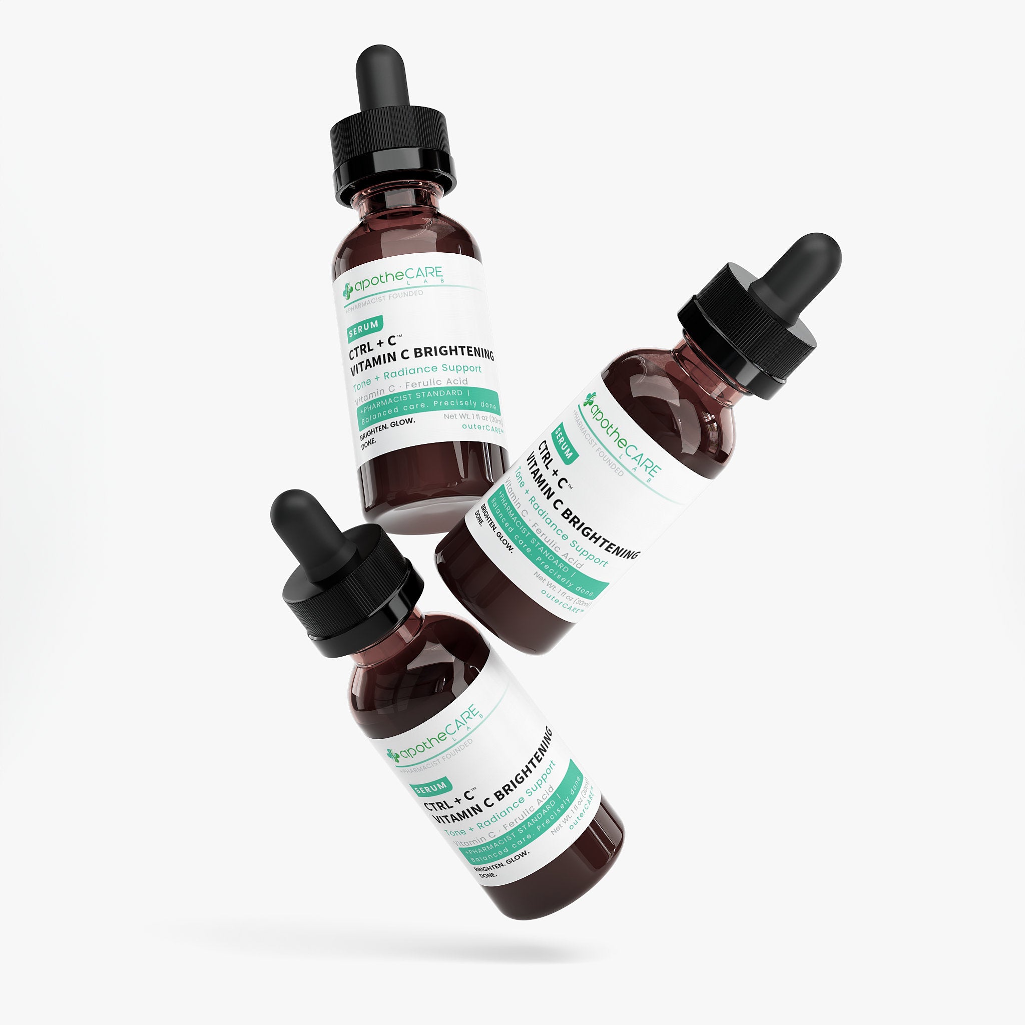 Three bottles of a skincare product with droppers on a white background