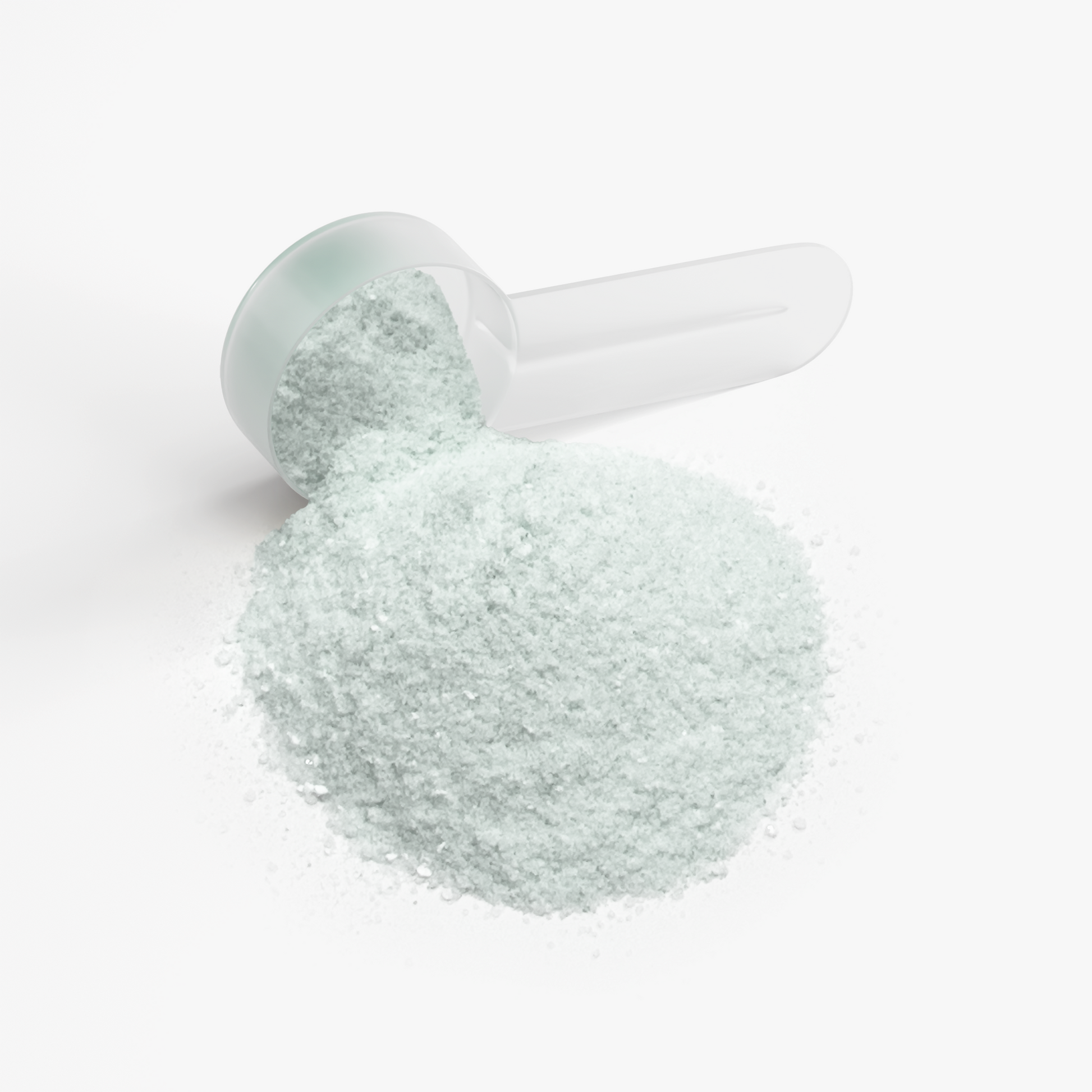 White powder in a clear plastic scoop on a white background