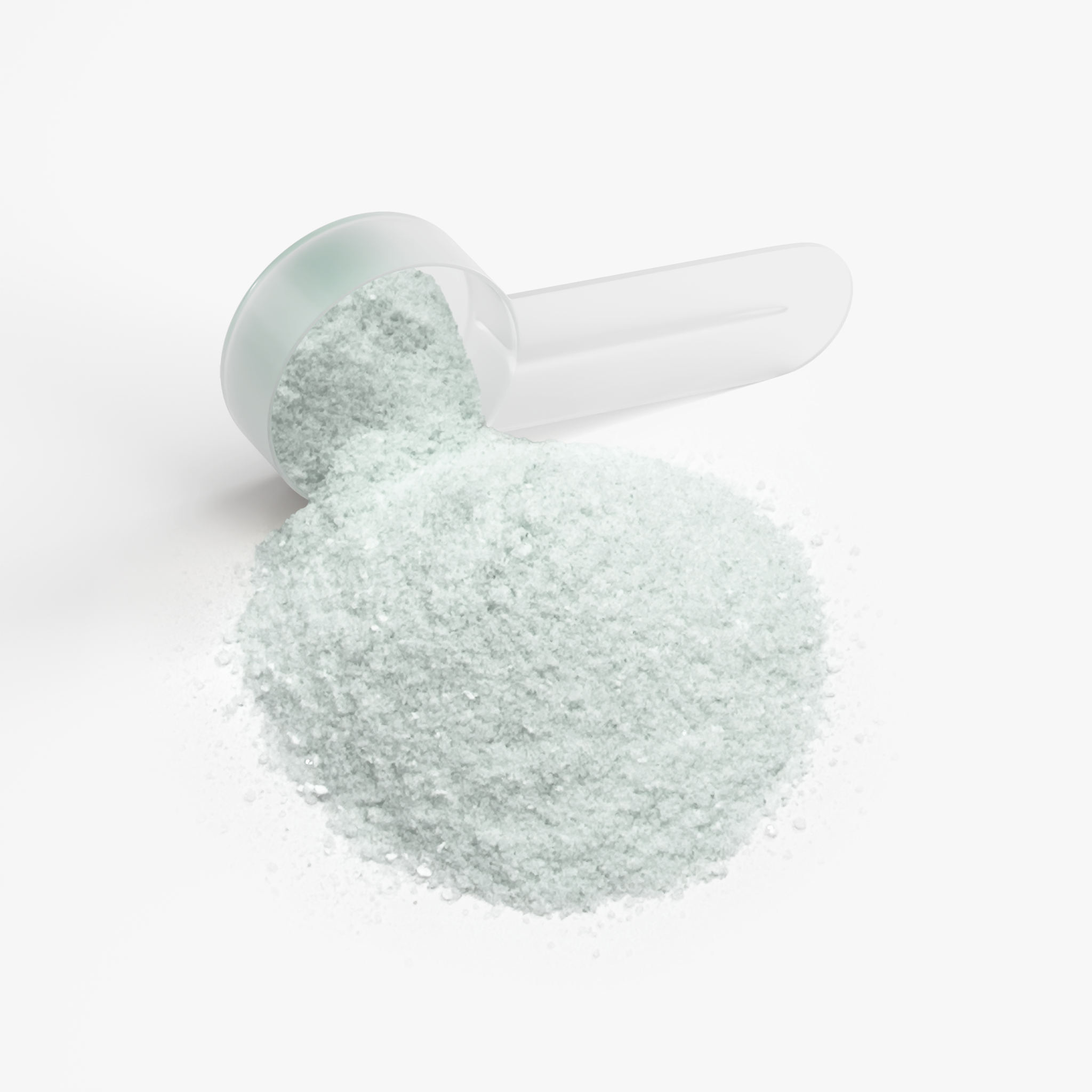 White powder in a clear plastic scoop on a white background