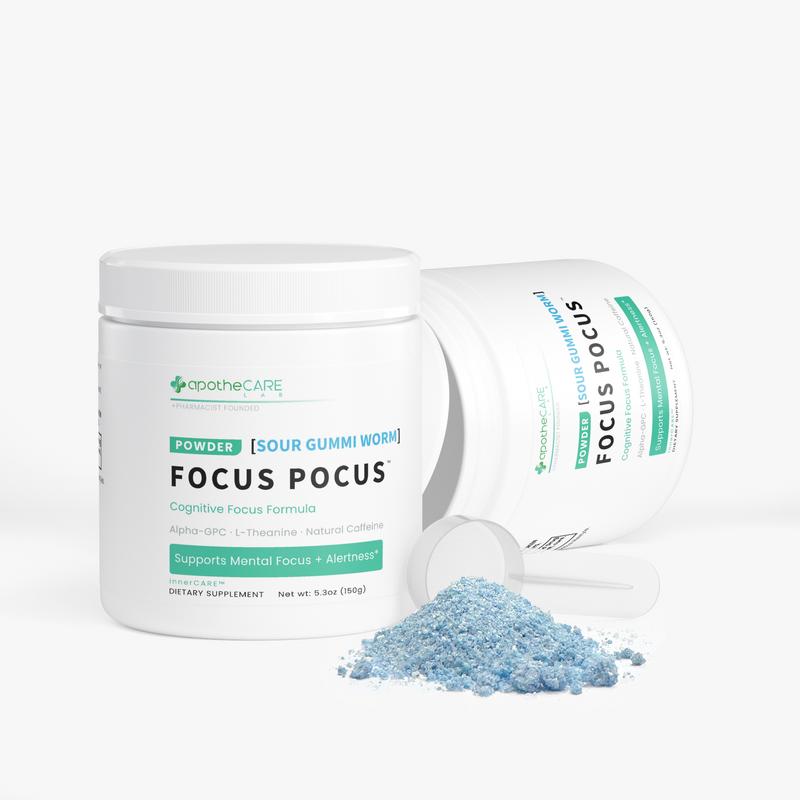 Two white jars of apotheCare Lab Focus Pocus dietary supplement powder, one standing upright and one lying on its side, with a small pile of light blue powder in front, on a clean white background.