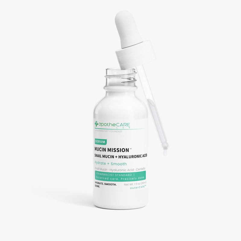 A white glass dropper bottle of apotheCARE Mucin Mission serum with a white plastic dropper resting on top, set against a clean white background.
