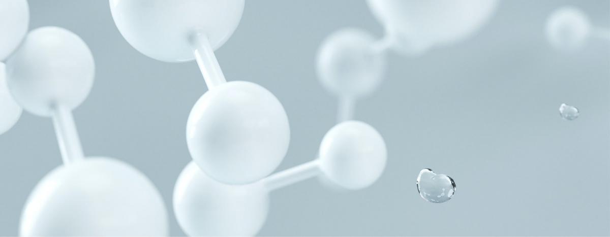 Molecular structure with a water droplet on a light gray background